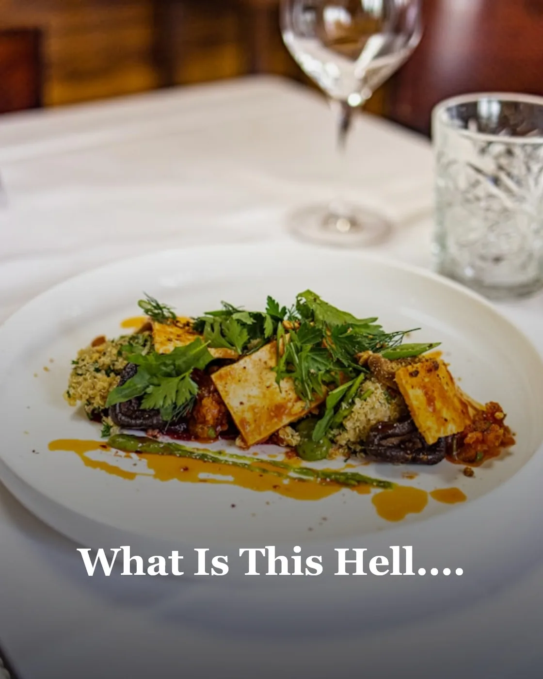 a white plate topped with food on top of a table