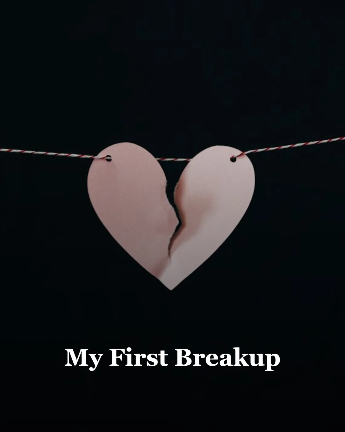 broken heart hanging on wire